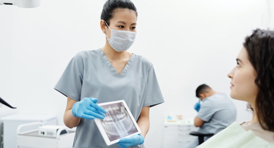 Patient reviewing dental x rays